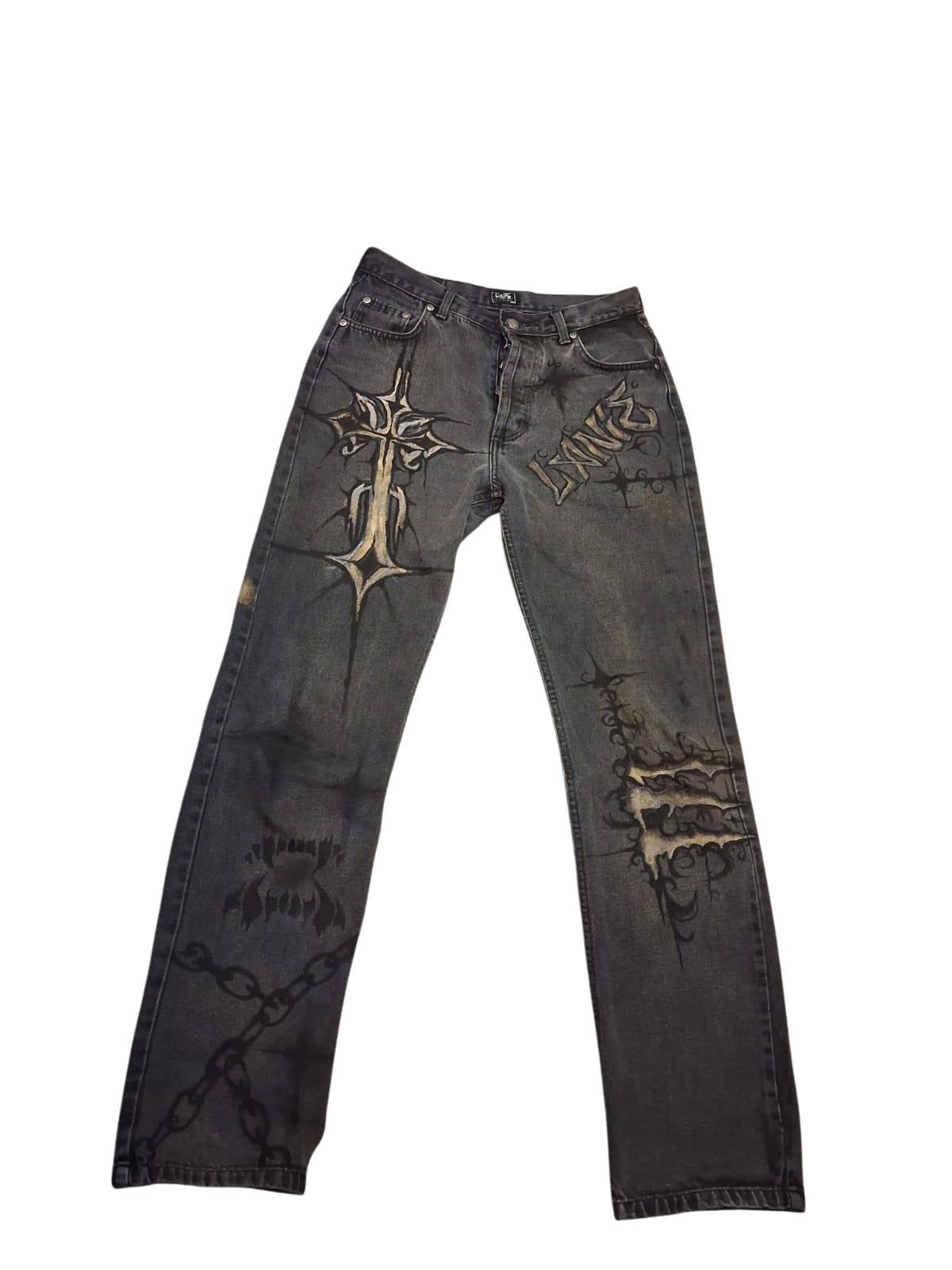Front of the same dark jeans with hand-painted symbols, lettering and bleach details